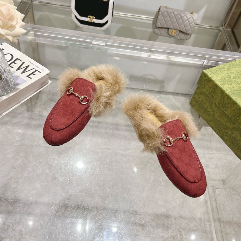 G*u*i slippers